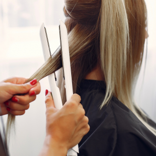 hairdresser-does-hairstyle-her-client